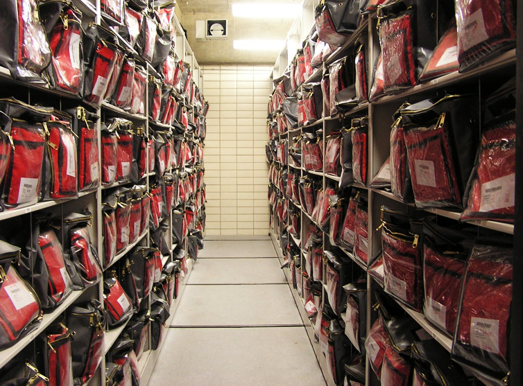 inmate-property-bags-on-open-shelf